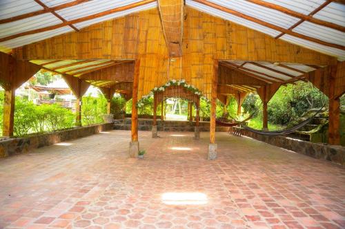Κήπος έξω από το Hotel Campestre Inaoska Ecospa