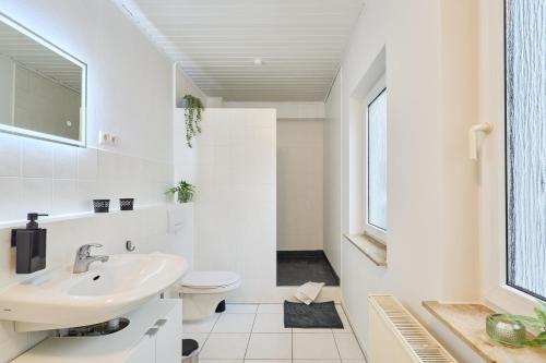 Koupelna v ubytování Charmante Wohnung in Waren by Nordic Homes