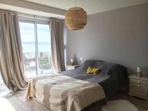 Postel nebo postele na pokoji v ubytování Villa Roche Mignonne