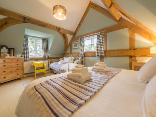 Ένα ή περισσότερα κρεβάτια σε δωμάτιο στο Bearwood Cottage
