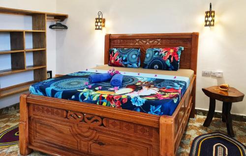 Letto o letti in una camera di Apartments Zanz J&J Nungwi