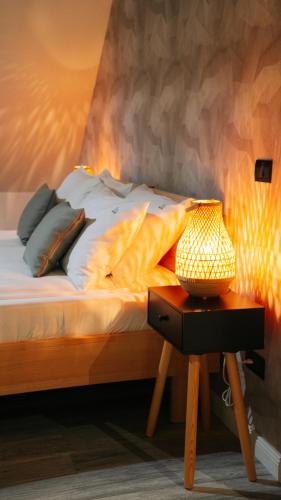 Katil atau katil-katil dalam bilik di Nature Nest Bran - Adults Only