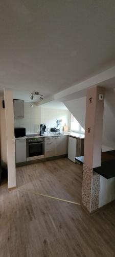 Η κουζίνα ή μικρή κουζίνα στο Ferienwohnung Zur Ölmühle