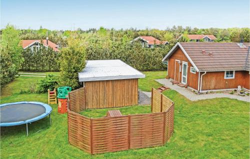 an aerial view of a house with a playground at Holiday Home Blomstervangen Ka Denm in Oksbøl