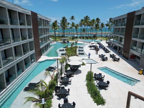 an aerial view of a resort with a swimming pool at Porto Alto Resort GAV em Muro Alto in Cupe