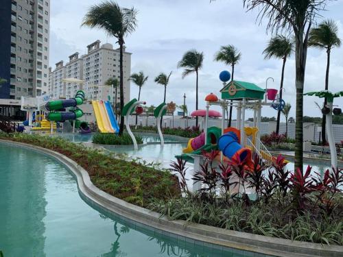 a water park with a water slide and a playground at S&F apartamentos em Salinas Park, Exclusive ou Premiun in Salinópolis