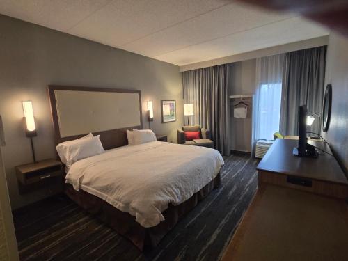 Postel nebo postele na pokoji v ubytování Hampton Inn Commerce