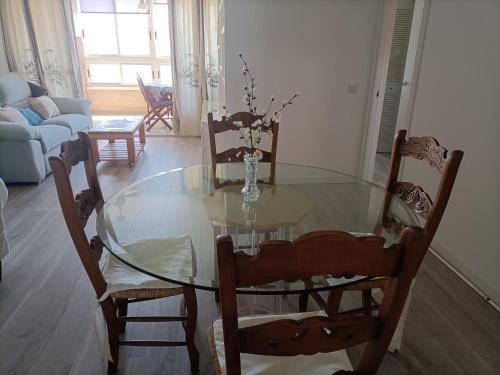 Coin salon dans l'établissement Alminares Playa 3 dormitorios