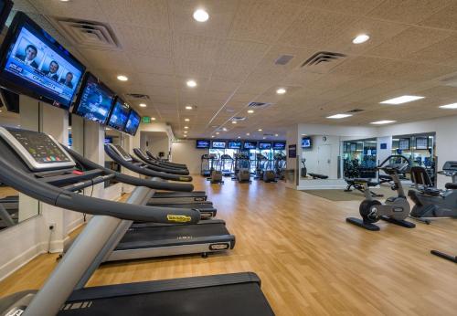 a gym with several treadmills and cardio machines at Westgate Vacation Villas Resort in Orlando