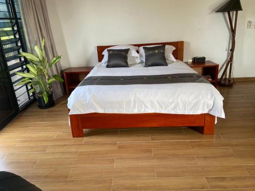 Ένα ή περισσότερα κρεβάτια σε δωμάτιο στο Naisoso Island Villa - Fiji
