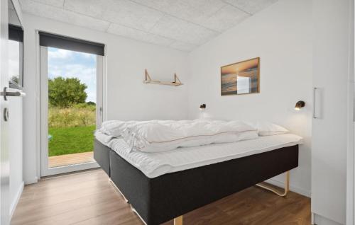 Katil atau katil-katil dalam bilik di 5 Bedroom Pet Friendly Home In Børkop
