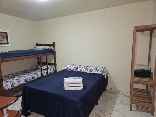 Un pat sau paturi într-o cameră la Casa Buziana - Centro