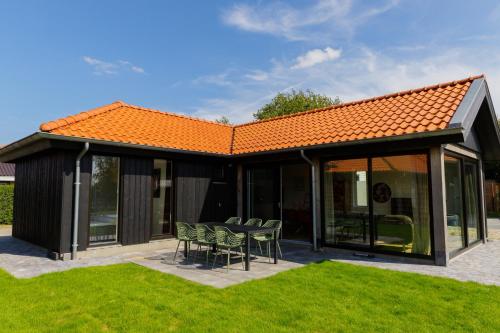 Ảnh trong thư viện ảnh của La Casita, Luxe Chalet Aan Het Water met Airco ở Anjum