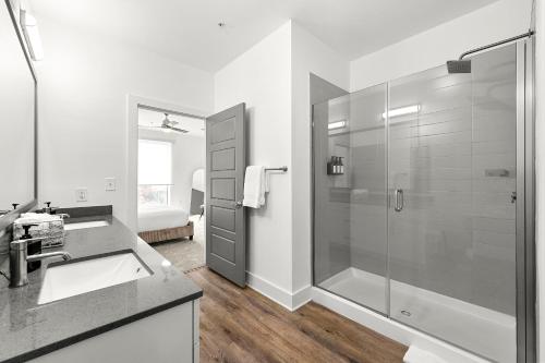 a bathroom with a shower and a sink at The Nomad ATL in Atlanta