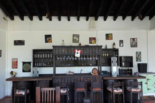 Loungen eller baren på Casa Alce