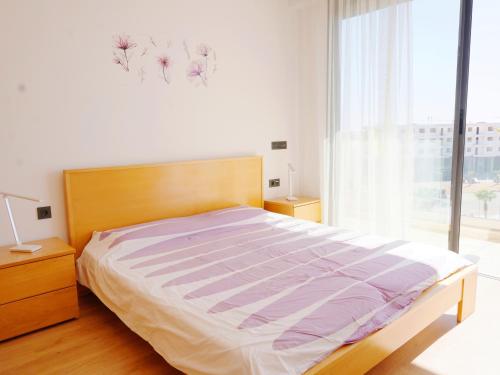 Postel nebo postele na pokoji v ubytování Geronticus apartment