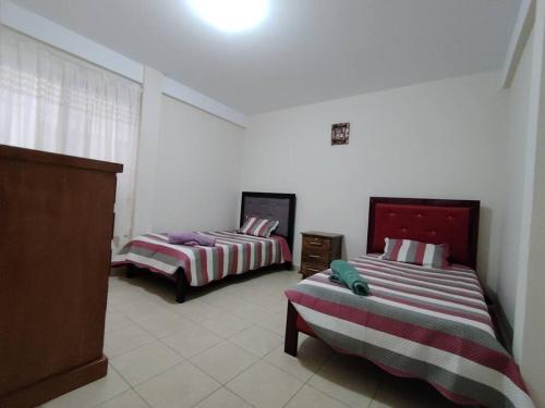Cama o camas de una habitación en Villa Serenidad