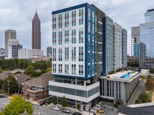 an aerial view of a tall building in a city at The Nomad ATL in Atlanta