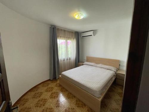 Ένα ή περισσότερα κρεβάτια σε δωμάτιο στο Casa Luna, 3 minutos de la playa de arena