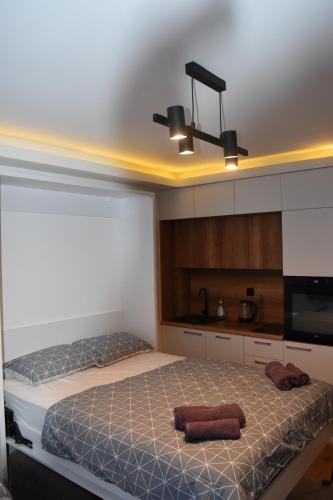 Ένα ή περισσότερα κρεβάτια σε δωμάτιο στο Apartment Delight