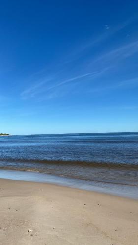 a view of the ocean from the beach at La Quimera del Águila in Atlántida