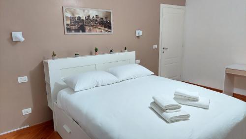 Ένα ή περισσότερα κρεβάτια σε δωμάτιο στο Comfort zone apartment - air conditioning