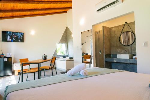 Katil atau katil-katil dalam bilik di Quattuor Cabanas. Privacidade e conforto com hidromassagem