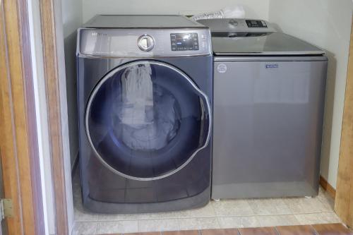 a washer and a dryer in a room at Lakefront Unit with Dock in Carlsbad! in Carlsbad