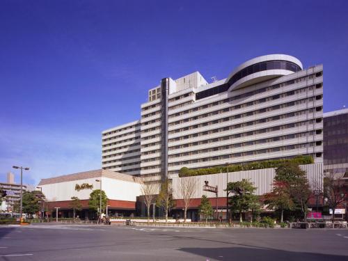 a large white building with a lot of windows at Hotel New Otani Hakata in Fukuoka