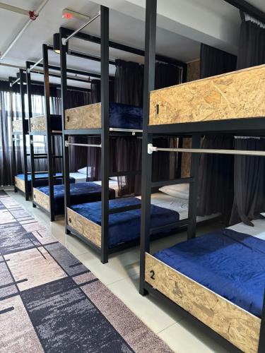 Ένα ή περισσότερα κρεβάτια σε δωμάτιο στο Female Hostel KL by ChillOut Hostel x