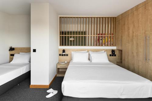 Una cama o camas en una habitación de Park Hotel