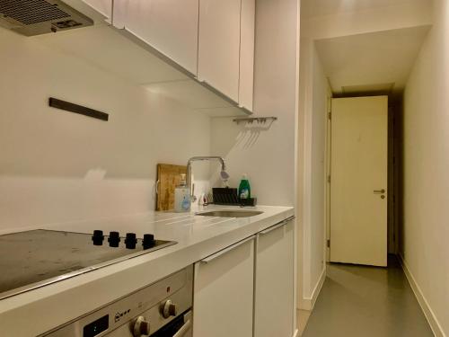 a kitchen with a sink and a counter top at STUNNING!!! City-Center!! Retreat with Modern Amenities in Birmingham