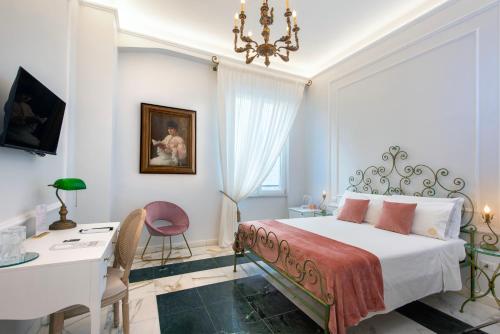 Ένα ή περισσότερα κρεβάτια σε δωμάτιο στο Residenza Borbonica