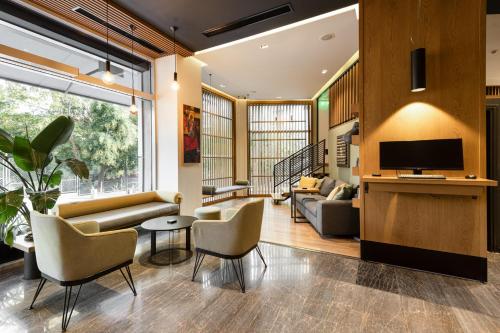 TV a/nebo společenská místnost v ubytování Park Hotel