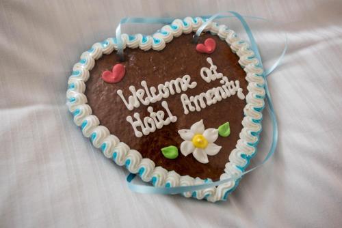 a cake in the shape of a heart at Hotel AMENITY in Munich