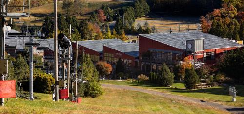 a large red building with a road in front of it at Bear Creek Mountain Resort in Breinigsville