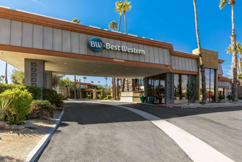 a building with a buy best western sign on it at Best Western Date Tree Hotel in Indio