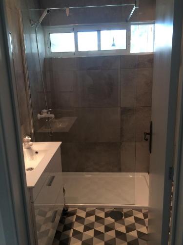 a bathroom with a shower and a sink at Apt. Downtown 2 in Funchal