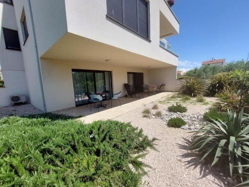 Apartments with parking space Krk - 23610