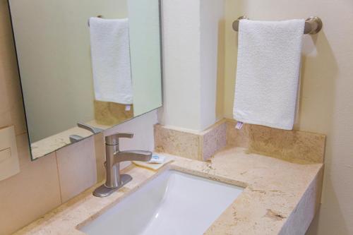 Ein Badezimmer in der Unterkunft Hotel Nonni