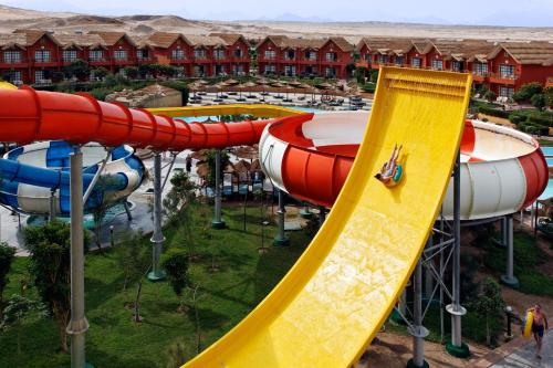 an aerial view of a water park with a slide at Pickalbatros Jungle Aqua Park - Neverland Hurghada in Hurghada