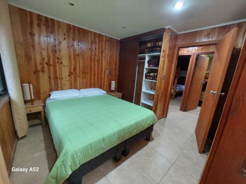 Ένα ή περισσότερα κρεβάτια σε δωμάτιο στο Cabañas privadas Pucon