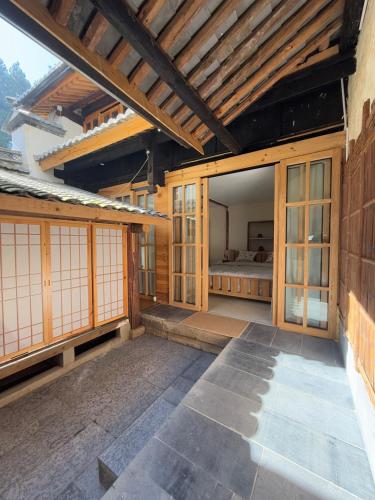 Gambar di galeri bagi Zen mountain residence half hidden in the mountains di Jianchuan