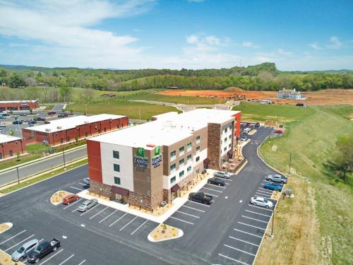 an aerial view of a parking lot next to a building at Holiday Inn Express & Suites - Abingdon by IHG in Abingdon