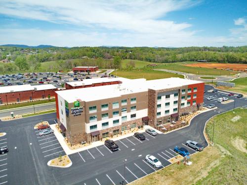 an aerial view of a building with a parking lot at Holiday Inn Express & Suites - Abingdon by IHG in Abingdon