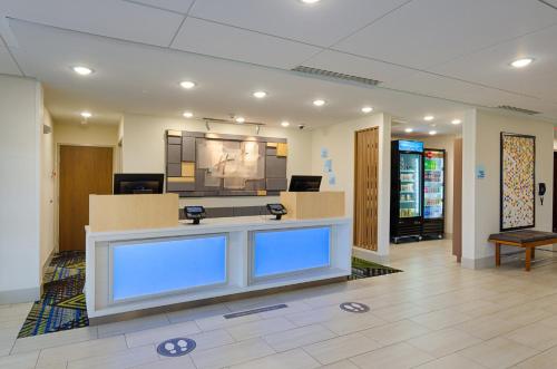a waiting area in a hospital with blue lights at Holiday Inn Express & Suites - Abingdon by IHG in Abingdon