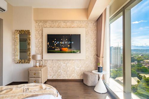 Postel nebo postele na pokoji v ubytování Aeon Towers Apartments I Next to Abreeza Ayala Malls I Prime Location l Fast Wifi l Free Pool I Managed by Bleuspace