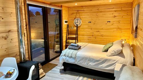 Postel nebo postele na pokoji v ubytování Puerta austral
