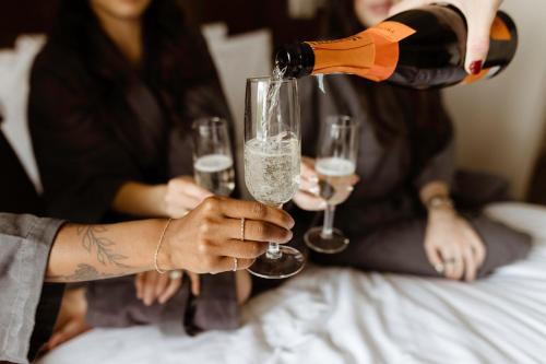 a group of people holding glasses of wine at Boston Marriott Peabody in Peabody