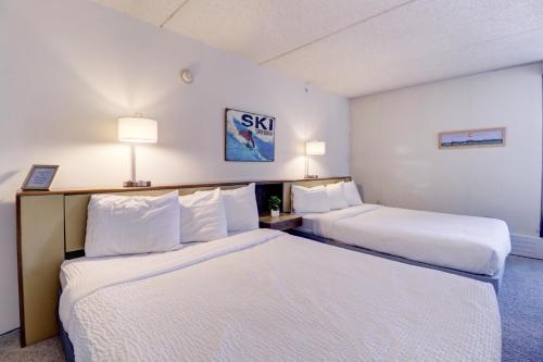 a hotel room with two beds and two lamps at MP522 Mountain Plaza Hotel Room in Copper Mountain